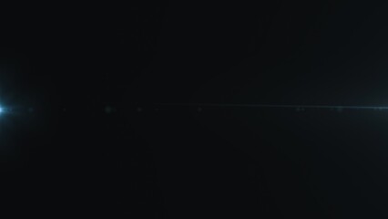 Abstract lens flare with light streak in dark background