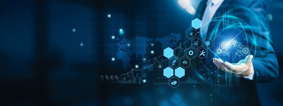 Engineer holding control panel. Automation uses technology to perform tasks with minimal human input, increasing productivity and reducing errors.
