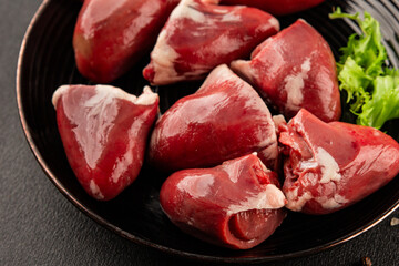 Turkey heart offal meat tasty snack fresh delicious gourmet food background on the table  rustic...