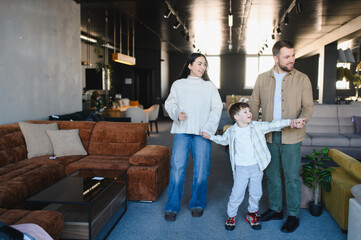 Obraz premium Family shopping for home furniture in store