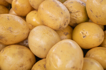 Fresh yellow fruits as natural food concept. Healthy nutrition fruits