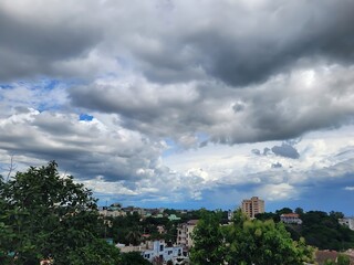 Cityscape under cloudy sky