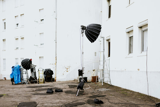 Outdoor film set with lighting equipment