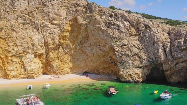 Zlata Beach cove and cliffs aerial view