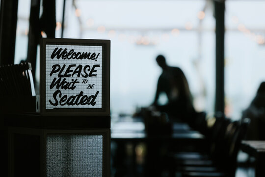 Please wait to be seated sign in restaurant