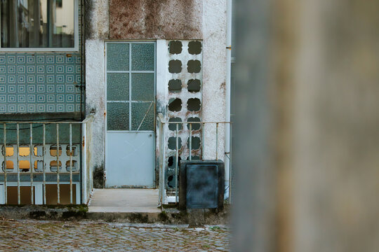 Weathered exterior of an urban building entrance