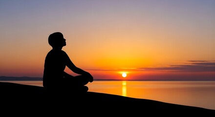 Fototapeta premium Silhouette of woman meditating on beach at sunset with golden sun