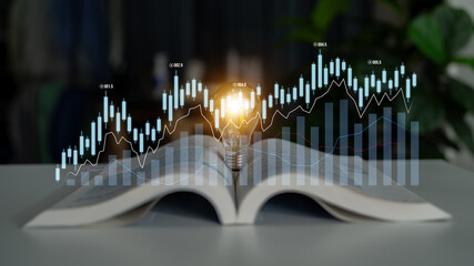 A conceptual image showcasing business growth with a light bulb on an open book, surrounded by...