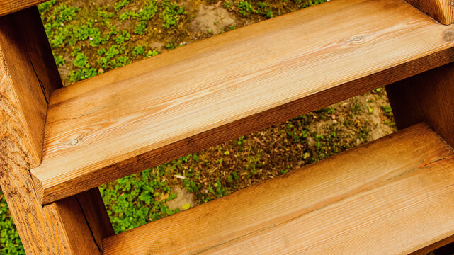 Wooden stairs with rustic plank steps in outdoor
