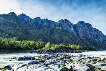River Valley with a rocky bank and scenic Mountain Views