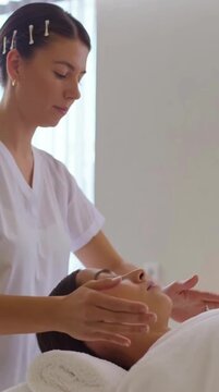 Reiki Healing Hands Above Woman During Holistic Therapy