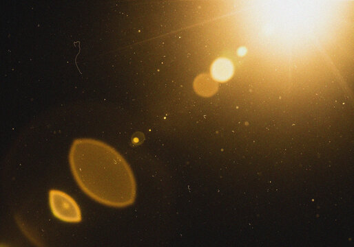 Golden Leak Light Lens Flare Background for Photography and Cinematic Effects