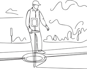 Man inspecting underground infrastructure with detection device at construction site