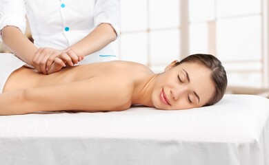 Obraz premium health, beauty and relaxation concept, woman getting massage