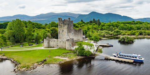 Aerial view of Ross Castle, 15th-century tower house and keep on the edge of Lough Leane, in Killarney National Park, Ireland. © MNStudio