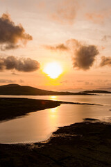 Fototapeta premium Aerial sunset view of Derreen river along the Ring of Kerry route. Rugged coast of on Iveragh Peninsula on sunset, Ireland.