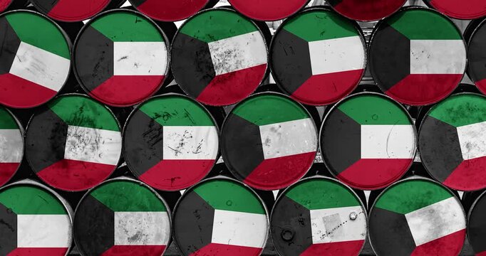 a panning of a lot of oil rusty barrels with the kuwait flag