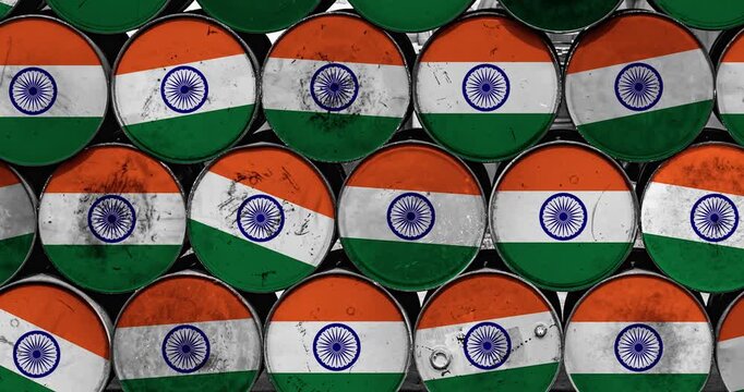 a panning of a lot of oil rusty barrels with the Indian flag