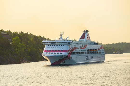 Vaxholm, Sweden - August 09 2025: Large Silja Line Baltic Princess cruise ship sailing in archipelago.