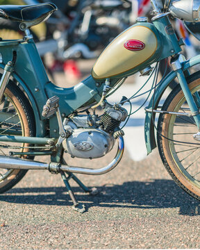 Gothenburg, Sweden - september 07 2025: Side view of vintage Crescent moped with chrome exhaust.