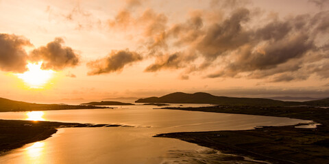 Aerial sunset view of Derreen river along the Ring of Kerry route. Rugged coast of on Iveragh...