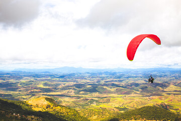 Parapent flying over the sky. World Capital of Free Flight. Governor Valadares. Championship of parapent.