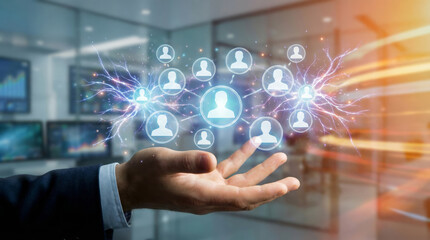 Fototapeta premium A hand reaches out in a modern office, displaying virtual connection symbols representing networking and collaboration among individuals. Data sharing drives innovation and teamwork