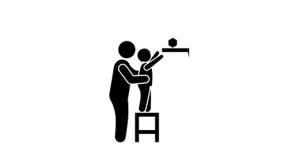 adult helping child on stool reach high shelf.