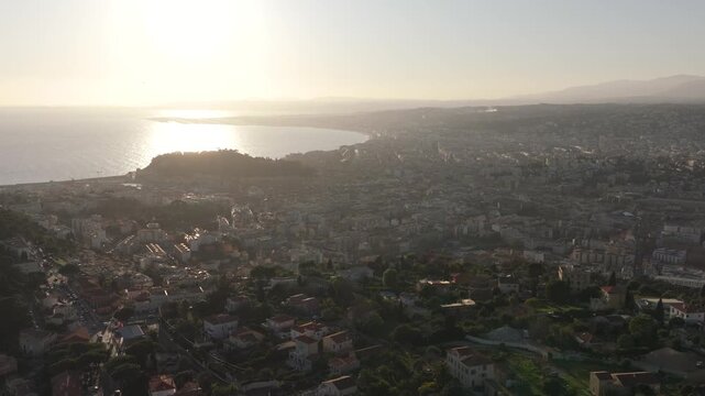 Aerial view of city of Nice urban landscape sunset drone video France 4K