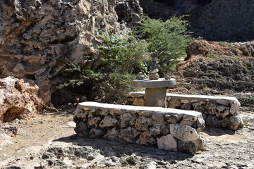 Picnic Table with Balancing Rocks on the Table