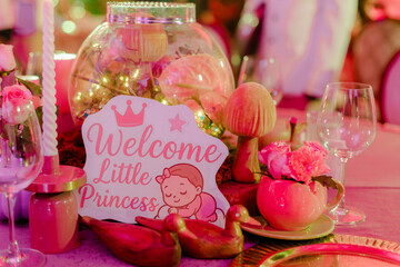 Elegant Baby Shower Decoration with Pink Theme: Candle, Flowers, Sign & Decorative Items Celebrate New Life in Style - Perfect for Event Decor & Invitation