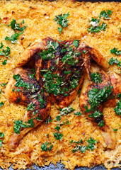 Spachkok  roast chicken with rice and lemon parsley sauce .top veiw