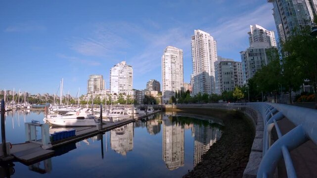 Vancouver Morning Marina and Skyline Reflection 4K UHD.Morning view of the Yaletown skyline on False Creek. Vancouver, British Columbia, Canada. 4K UHD.
