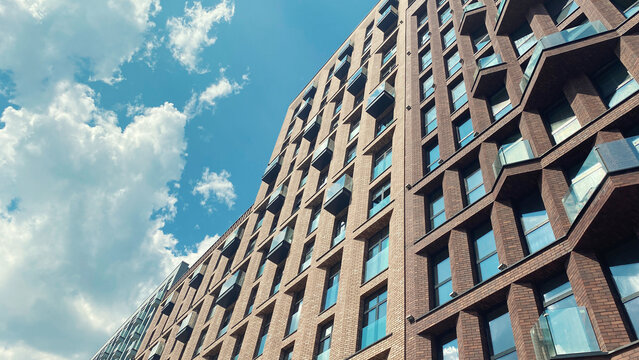 Architecture and real estate, modern residential apartment building with large panoramic windows
