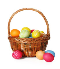 Easter basket with painted eggs isolated on white