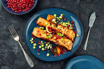 Delicious salmon with pomegranate.