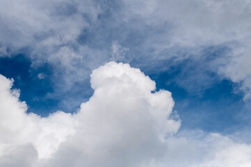 Obraz premium Bright White Cloudscape Against Deep Blue Sky With Fluffy Clouds and Soft Light