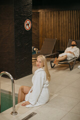 Couple relaxing at luxury spa hotel wellness complex