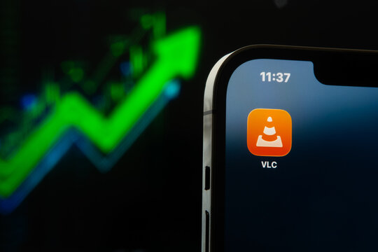 VLC app icon on phone screen with green rising graph representing popularity in multimedia software. Sonora, Mexico - January 27, 2026