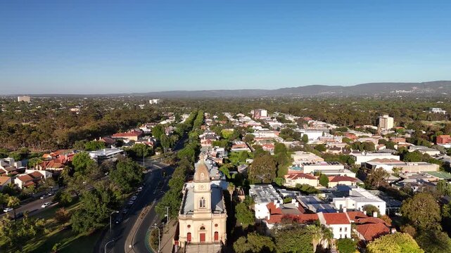 North Adelaide, South Australia: 4K Aerial Drone Footage of Brougham Place Uniting Church, CBD, Towers, Parklands, Suburban Houses, Residential Estates, City Landscape at Sunset