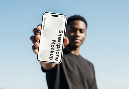 A black man showing a smartphone &ndash; mockup