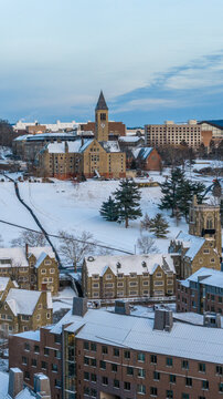 Ithaca, NY, USA - January 24, 2026 Vertical winter aerial photo of Cornell University, Ithaca, NY with snow on the ground.
