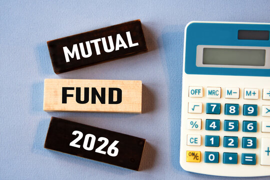 MUTUAL FUND 2026 - words on wooden colored blocks against a calculator background