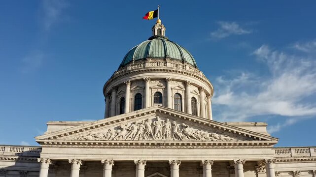 Classical building facade with dome and sculptures