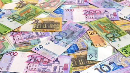 Scattered Belarus ruble banknotes background for financial and economy concepts