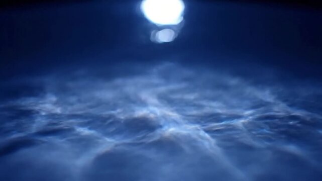Abstract Water Caustics Overhead view of shimmering, refracted light patterns on a gently disturbed water surface.