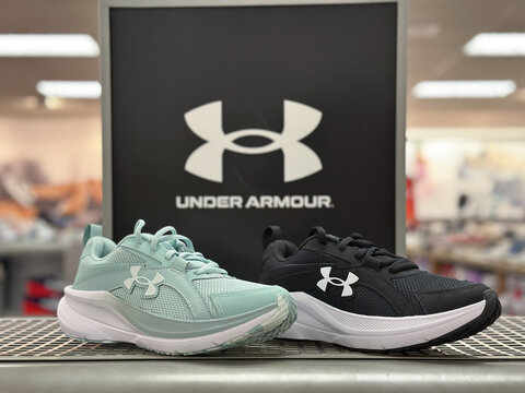 Livonia, Michigan, USA - 10 Jan 2026 : Stylish Under Armour brand sport shoes or footwear is displayed at a shelf at Kohls department store