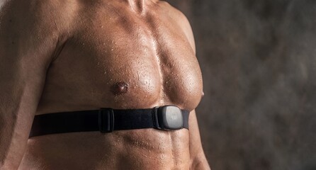 Naklejka premium Muscular Torso with Heart Rate Monitor, Fitness Technology