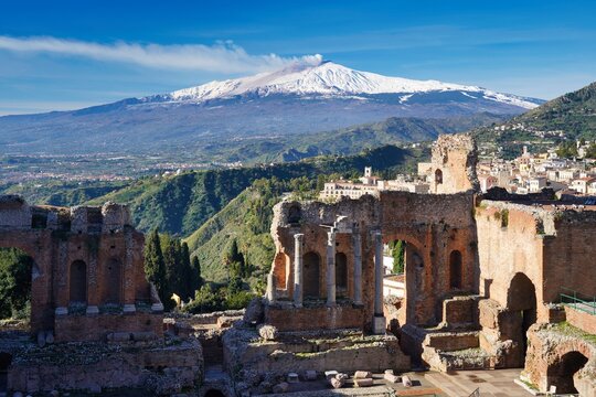 View of Mount Etna from the Ancient theatre of Taormina.