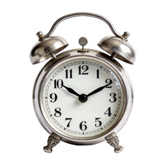 Vintage silver alarm clock with twin bells, white face, black numerals, and ornate legs. Isolated on white background, showcasing classic design and antique aesthetic.
